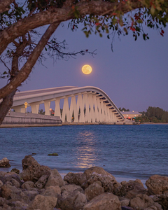 Wolf Moon Over Sanibel Causeway Bridge