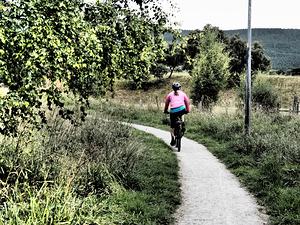 Scottish Highlands Cyclist on the Summer Path                                                                                                                     