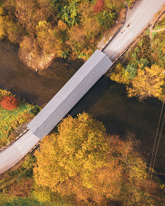 Top Down Aerial Schlichers Covered Bridge in Autumn