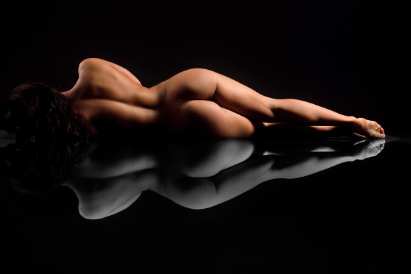 nude_woman_fine_art_laying_down_naked by Alessandrodellatorre