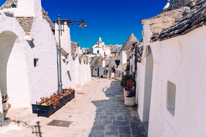 Narrow streets between the trulli of Alberobello in southern It