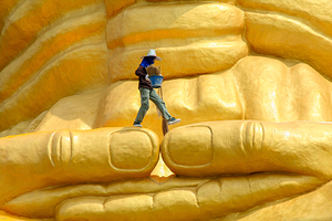 Statue of revered Buddhist monk Luang Phor Tuad in Ang Thong Thailand