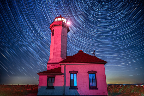 Point Wilson lighthouse star-trails by Charles Senn