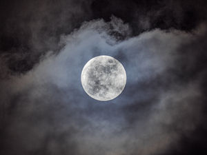 Moon Peaking Out of the Clouds