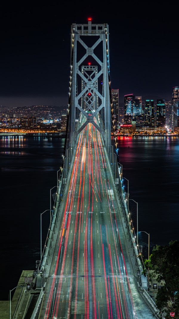 Oakland - San Francisco Bay Bridge at Night by David Yoon