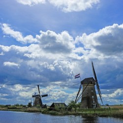 Blues Skies and Clouds over Kinderdijk Netherlands with the Windmills