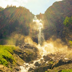 Engstligen Falls Bathed in Mist and Sunlight Adelboden Switzerland in the Bernese Highlands - Waterfall 