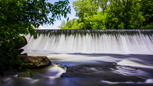 Smooth blurred water falling from reservoir