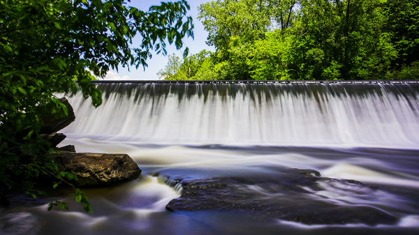 Smooth blurred water falling from reservoir by MVP