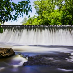 Smooth blurred water falling from reservoir