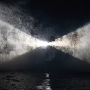 Lighthouse Beacon Over Dark Ocean