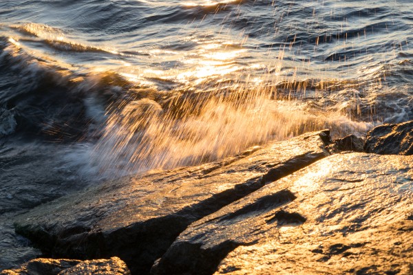 Golden Shower on the Rocks - Slo Mo Waves and Sunshine by GeorgiaM