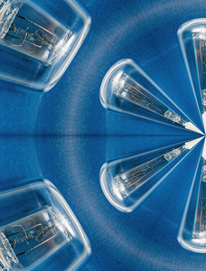 Close up macro shot of damaged broken standard tungsten wolfram filament of a lamp bulb