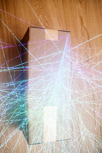 Cardboard Box with Futuristic Light Streaks