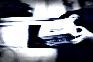 Distorted CCTV Footage of Woman Holding Box