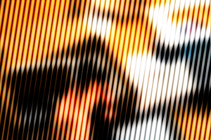 Close Up of Pixelated Face with Orange Tones