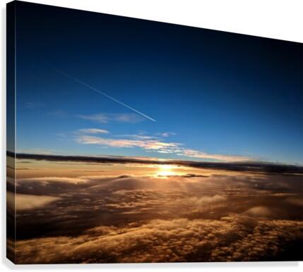 Sunset behind clouds Canvas Print