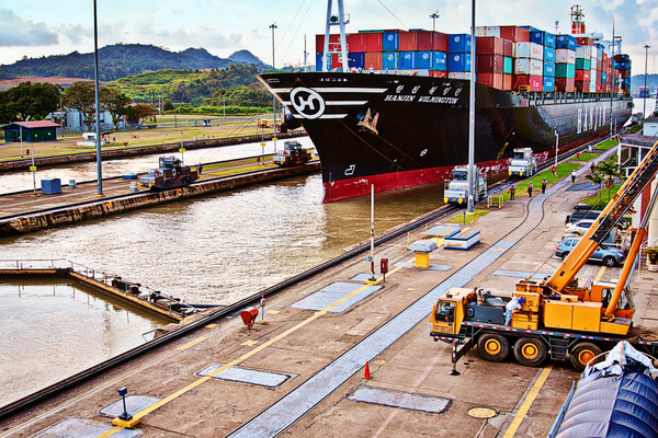 Containership crossing Panama Canal Panama by TatianaTravelways