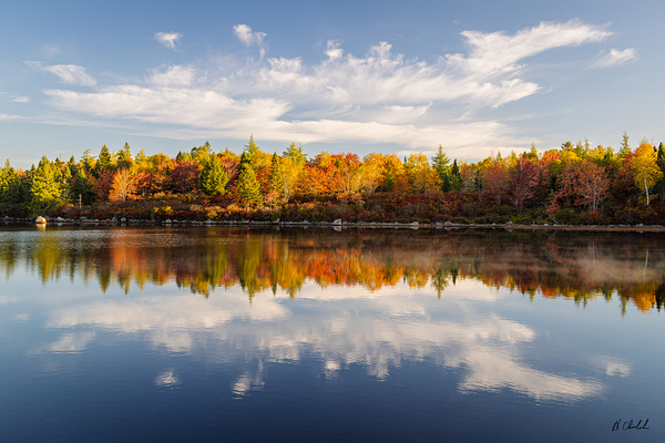 Dramatic clouds in an autumn sky by Hugh Chisholm Photography