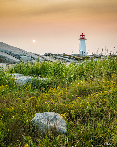Peggy s Cove Lighthouse Orange Sky by Hugh Chisholm Photography