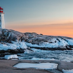 Peggy s Cove Lighthouse With Frozen Rocks