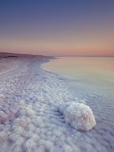 Dead sea shore at dusk Israel
