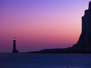 Lighthouse at dusk Beach