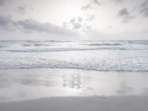 Tranquil beach with cloudscapes