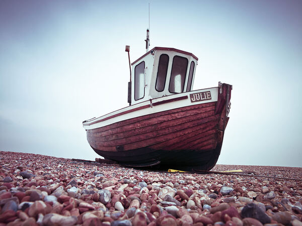 Boat Resting on Pebbled Strand Print