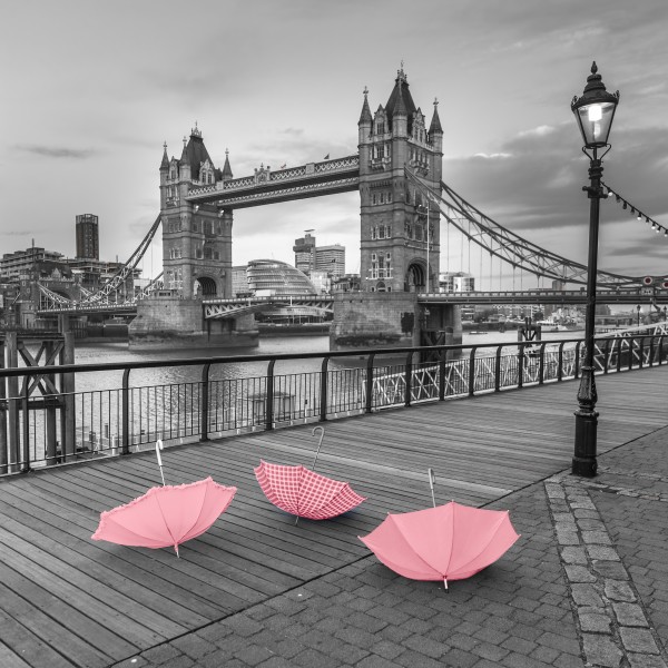 Pink umbrellas at Tower bridge, London, UK  Print