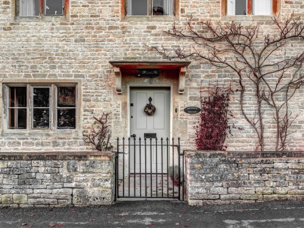 Front door of old cottage in Bibury,  Cotswold, UK Print