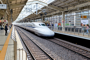 Shinkansen arrives at Kyoto Station in Japan during daylight
