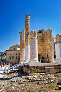Visitors explore Hadrians Library in Athens Greece on a sunny d