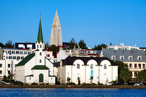 Reykjavik cityscape showing buildings by lake Tjornin in Iceland