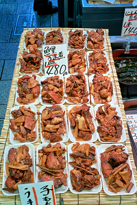 Food display at Nishiki Market in Kyoto Japan with various dish
