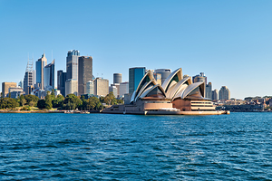 Sydney Opera House and city skyline across the water.