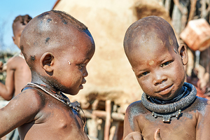 Children play in Himba Village in Kunene Region of Namibia
