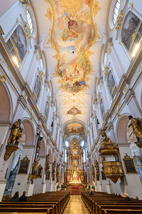 Exploring St. Peters Church in Munich Bavaria amid morning lig