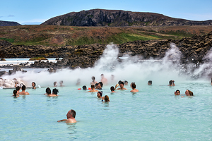 Relaxing in Blue Lagoon SPA Iceland on a sunny day