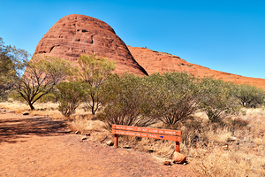Sacred area sign in front of Kata Tjuta domes Australia.