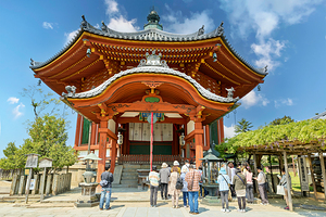 Visitors are praying at a temple in Nara Japan