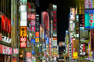 Neon lights shining in Shinjuku district of Tokyo during nightti