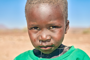 Children in Palmwag Kunene Region Damaraland in Namibia play tog
