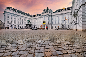 Majestic palace equestrian statue and cobblestone square under