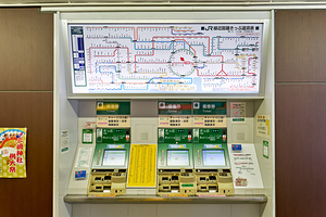 Metro ticket machine at a station in Tokyo Japan in busy settin