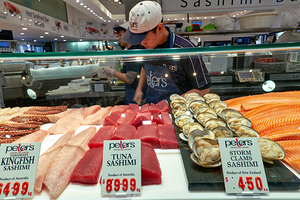 Fresh sashimi and seafood displayed at Peters Fish Market.