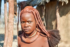 Traditional hair headdress of a woman in Himba village of Namibi