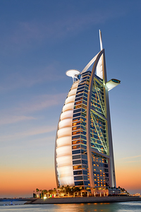 Burj Al Arab hotel at sunset in Dubai UAE with beautiful sky
