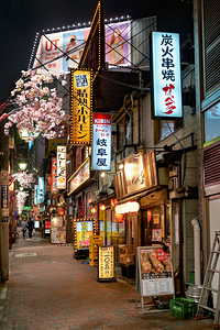 Restaurants in Shinjuku district show colorful lights at night