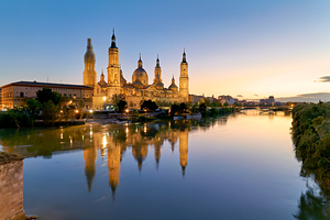 Zaragoza. Saragossa. Aragon. Spain. Cathedral Basilica of Our Lady of the Pillar and river Ebro at sunset